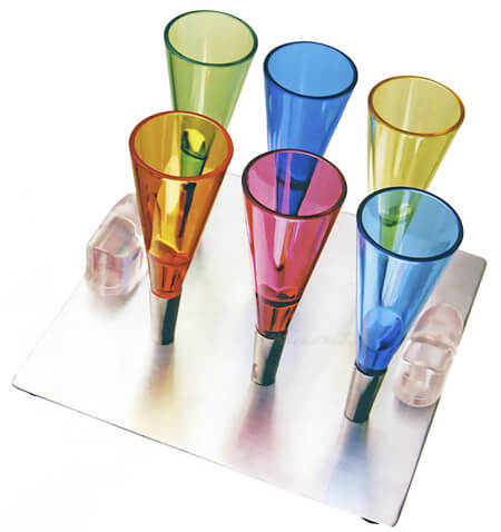 colorful magnetic shot glasses on a metal tray