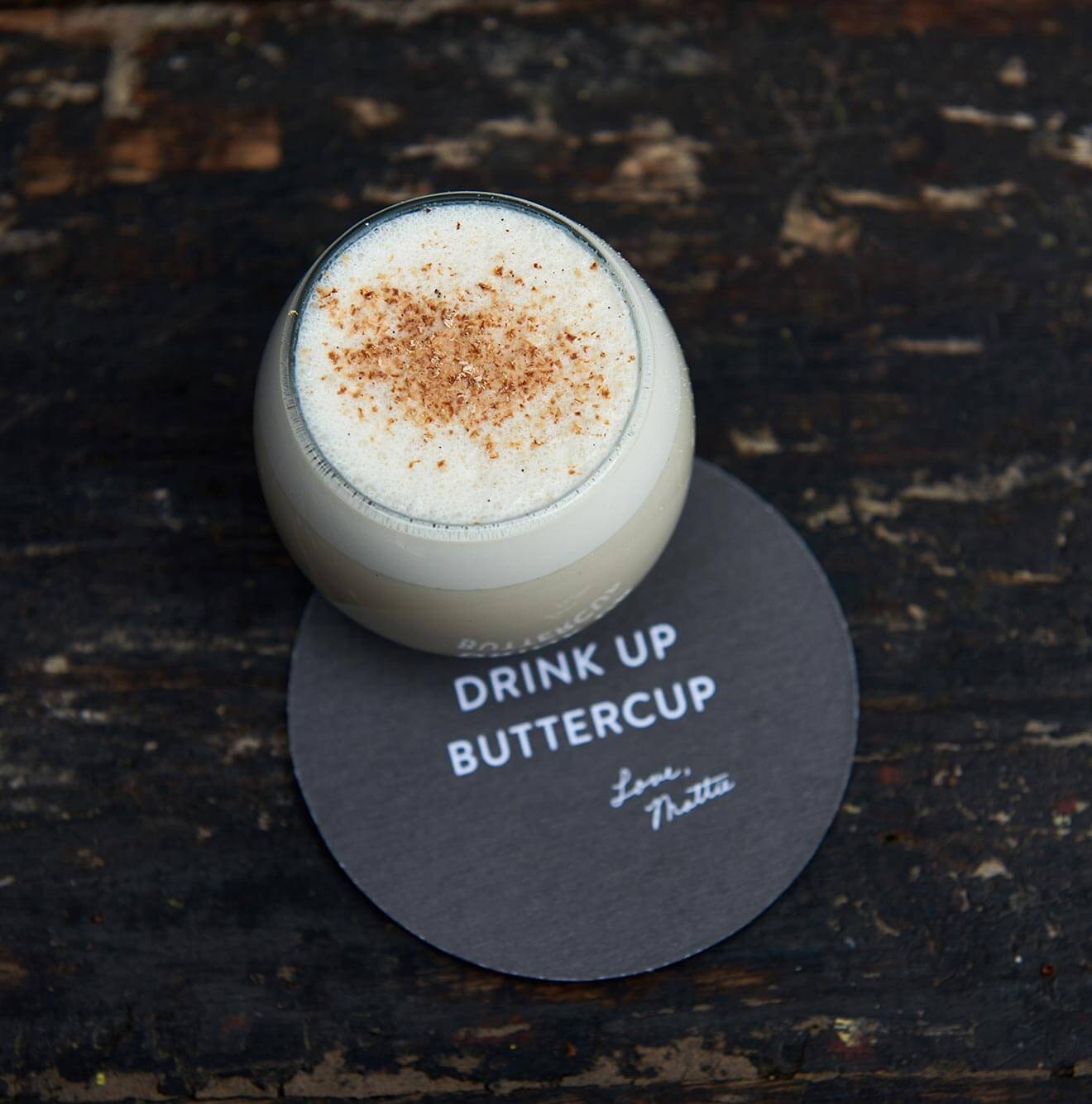 1965 Milk Punch, cocktail on coaster