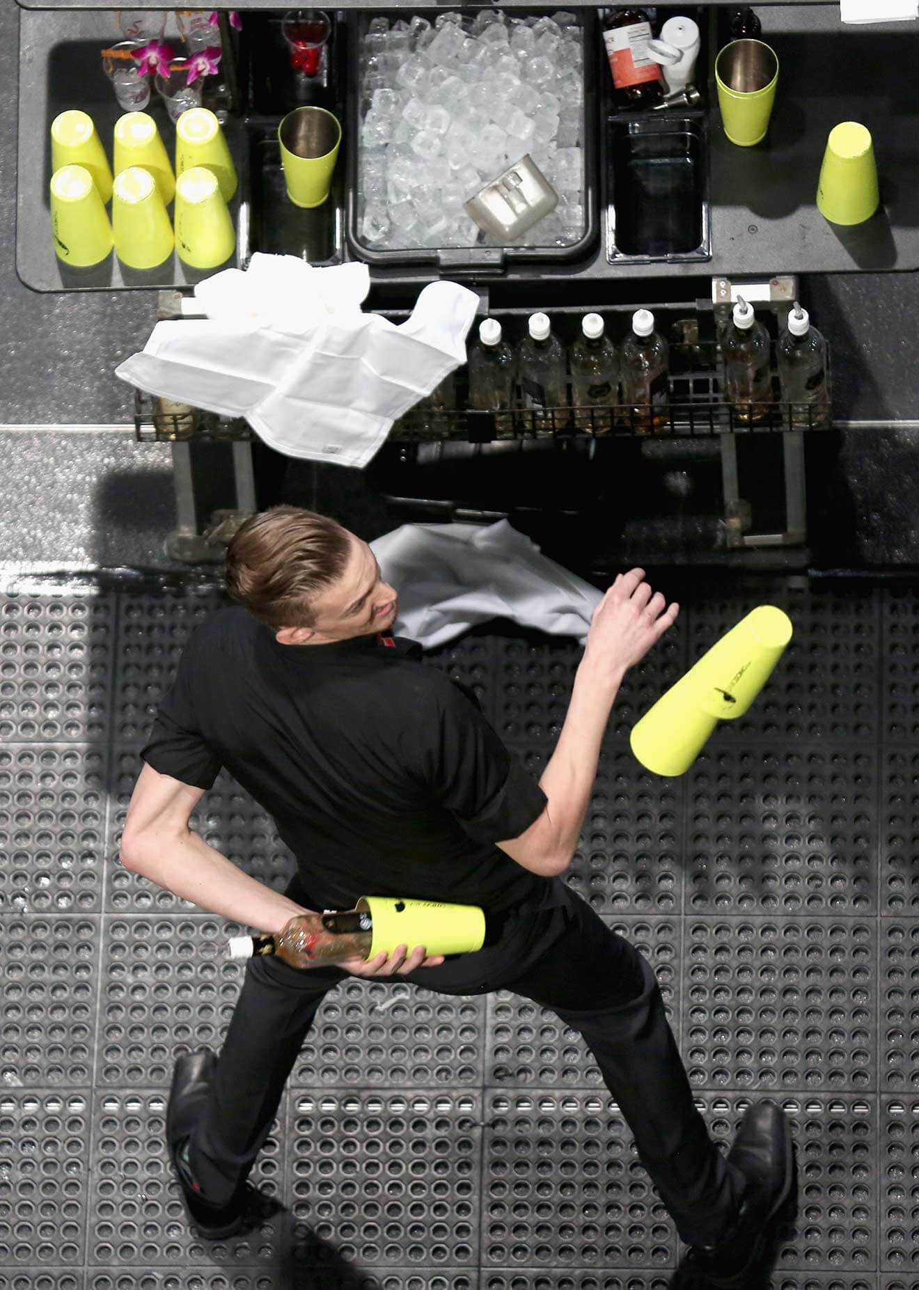 A bartender performs onstage during the 31st Annual Nightclub & Bar Convention And Trade Show
