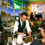 Vagabond Hotel bartender serving a custom crafted Ardbeg cocktail