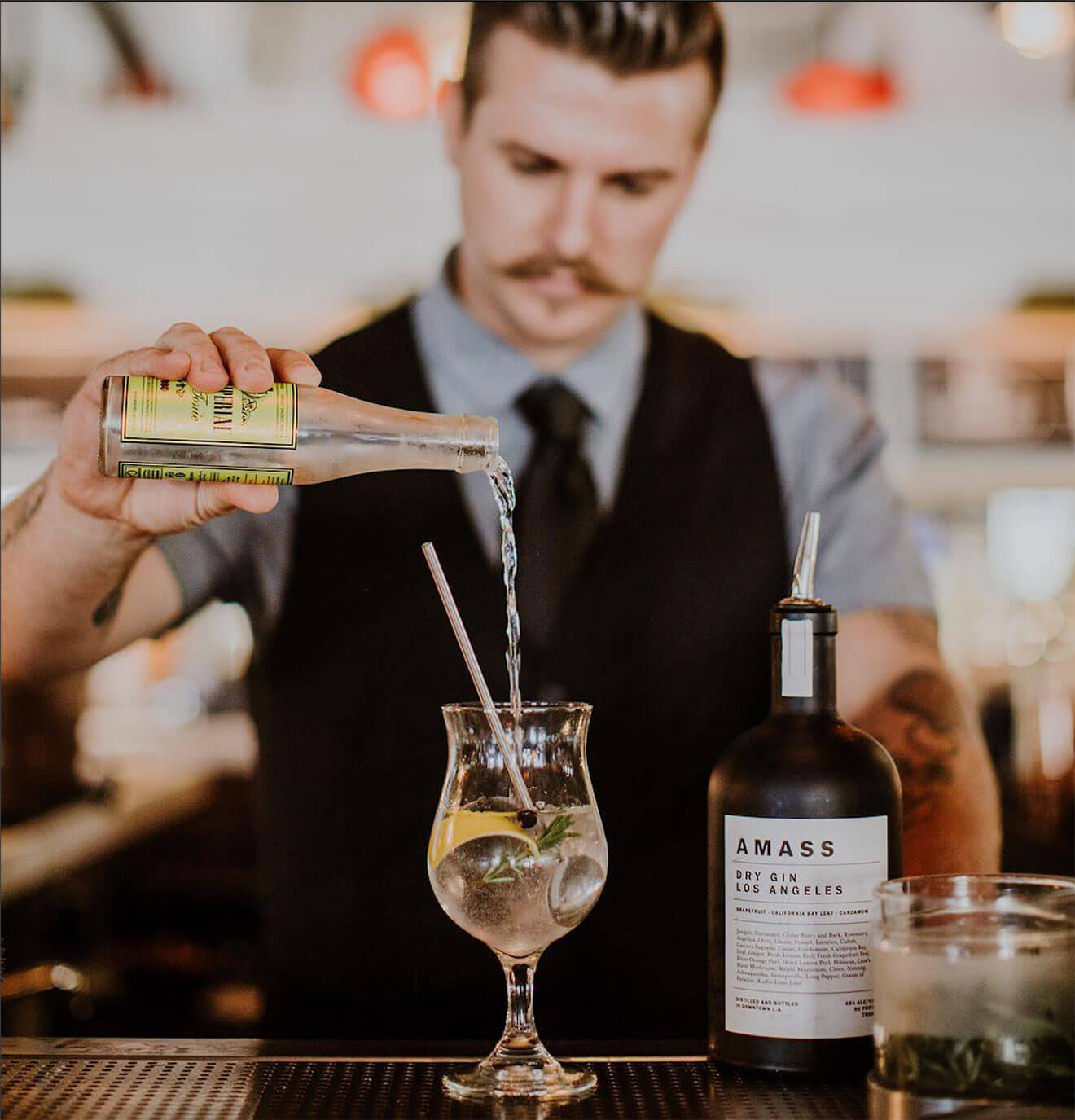 AMASS G&T, mixologist pouring