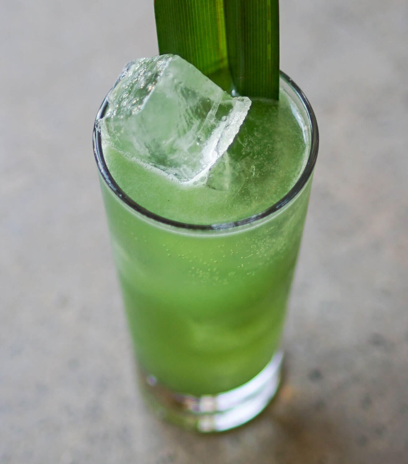 A&W Cocktail, green cocktail with large ice cubes