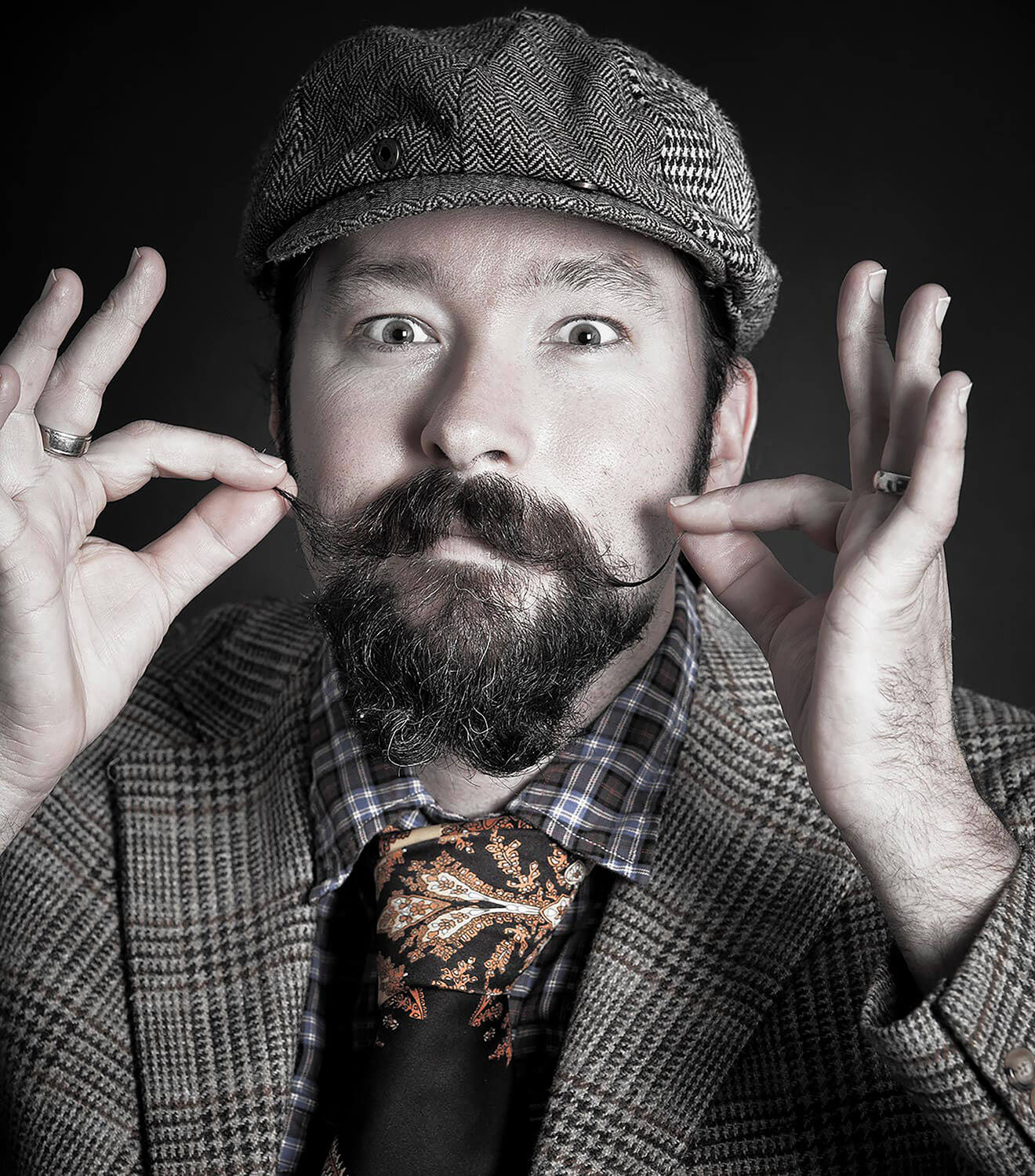 adam rains portrait, twisting dapper mustache