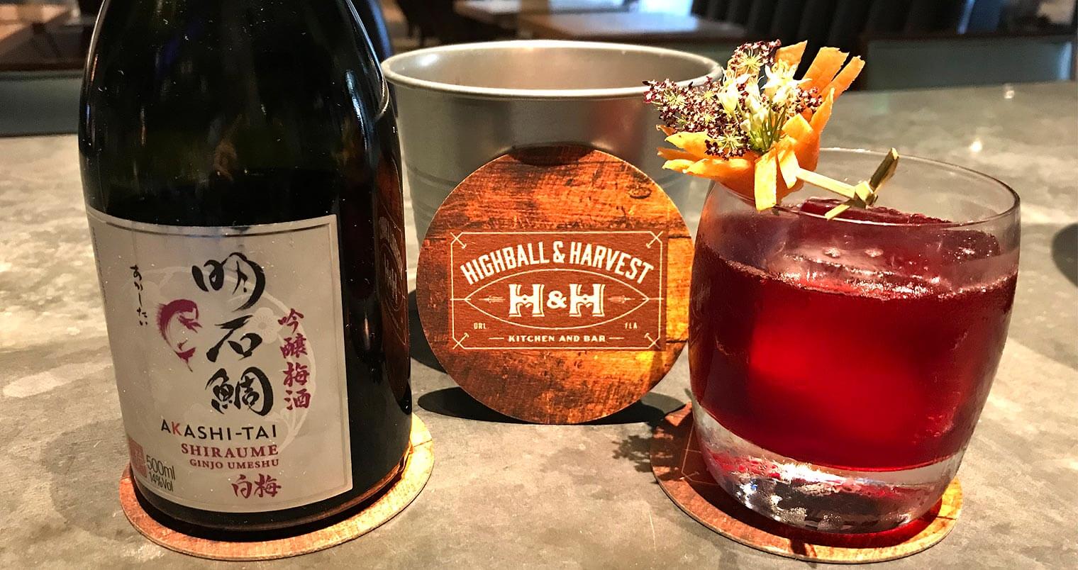 Akashi Tai Sake Old Fashioned, cocktail and bottle, featured image