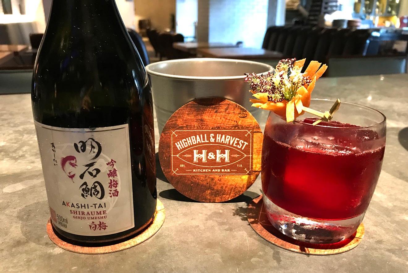 Akashi Tai Sake Old Fashioned, cocktail and bottle
