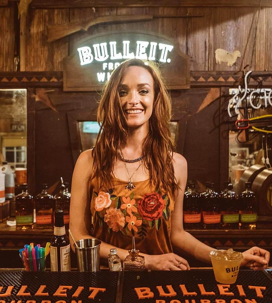Anne Vaughn, Austin, Texas, bartending behind bar