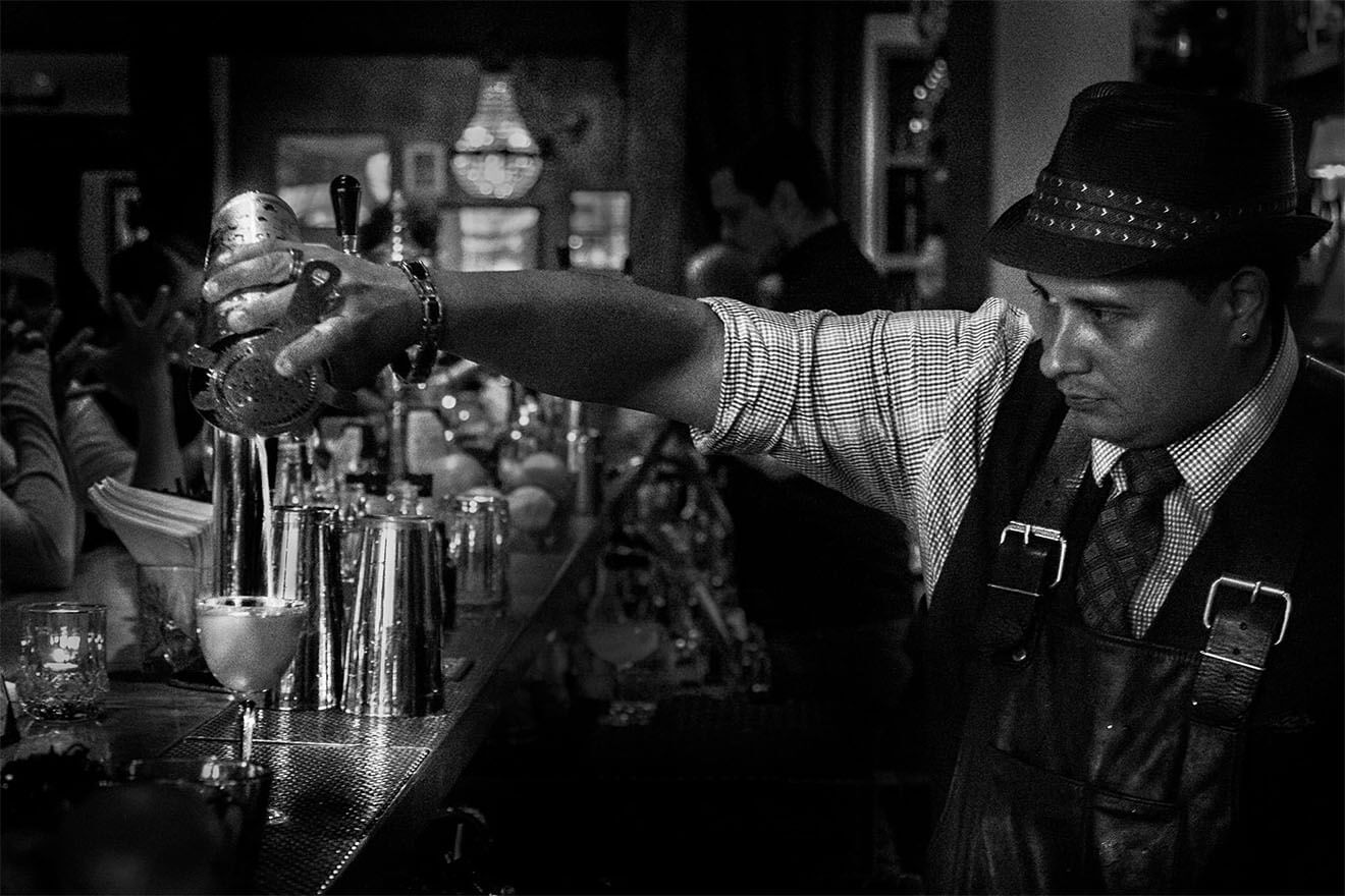 Alex Velez - Chilled 100 Member, San Francisco, mixing behind the bar, black and white