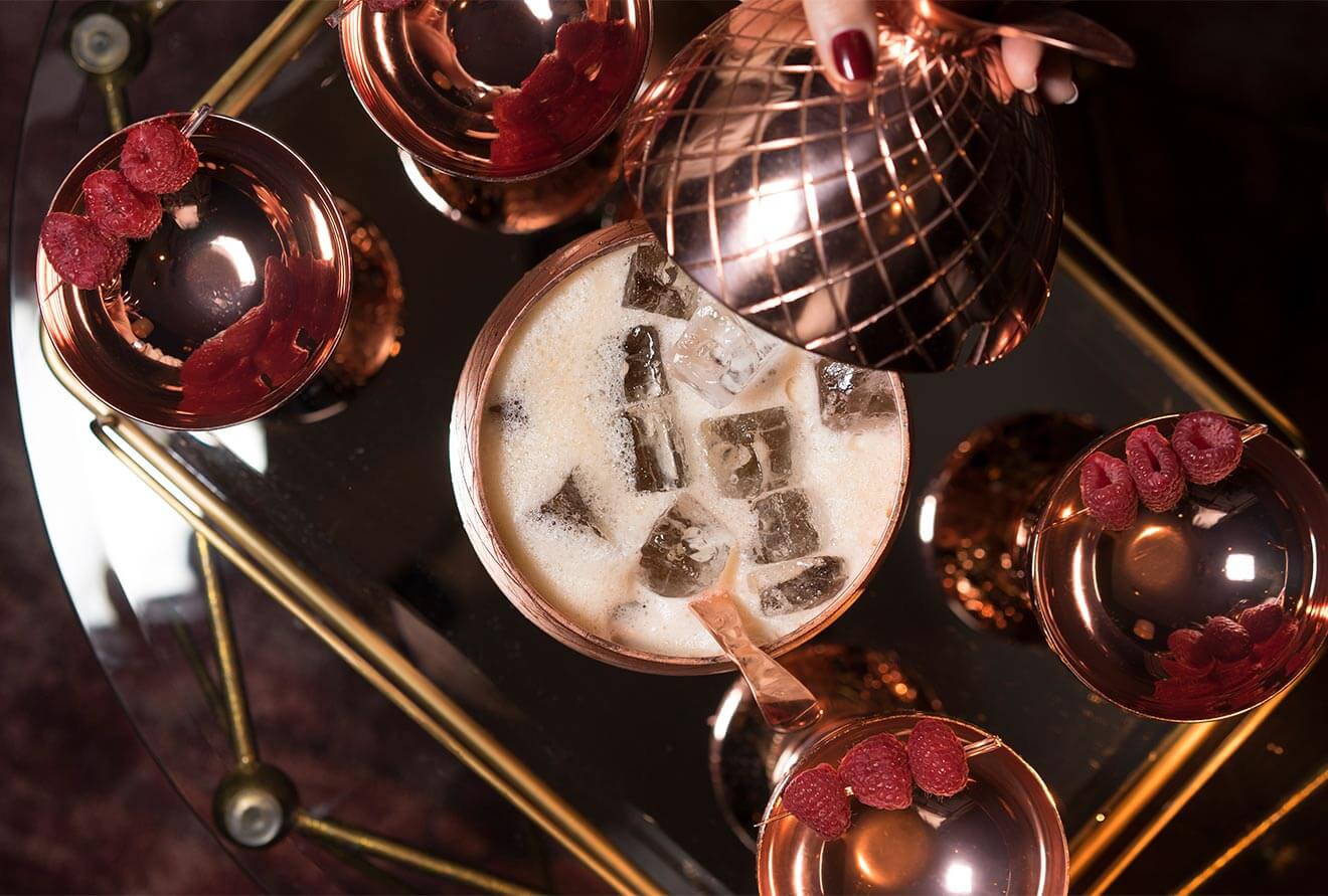 Beaux-Arts-Beauty, overhead view of cocktail, with garnish, featured image