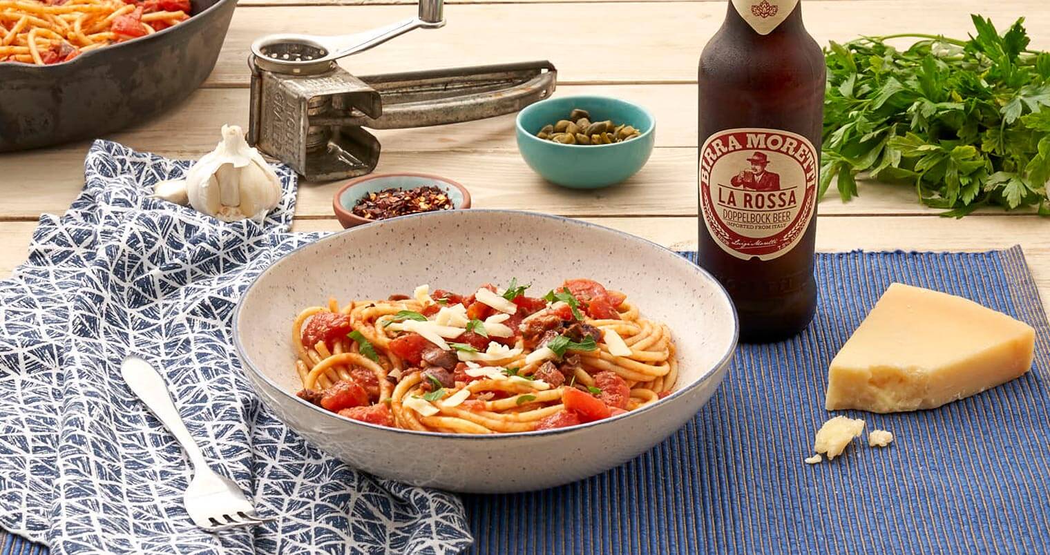 Birra Moretti 'What's More Italian' Summer Program, bottle and dishes display on dining table, garnishes, featured image