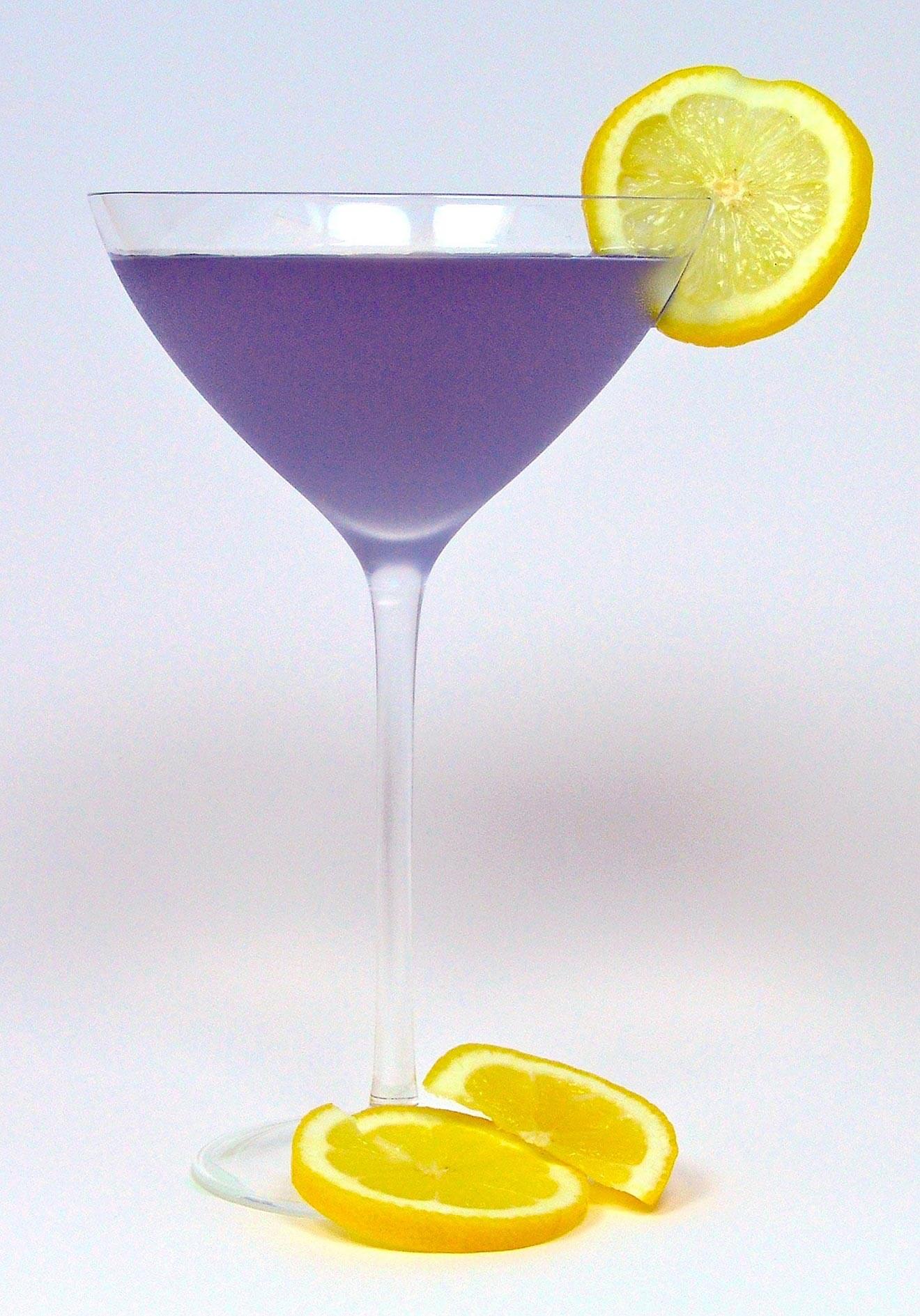 Brazilian cocktail with lemon wheel garnish