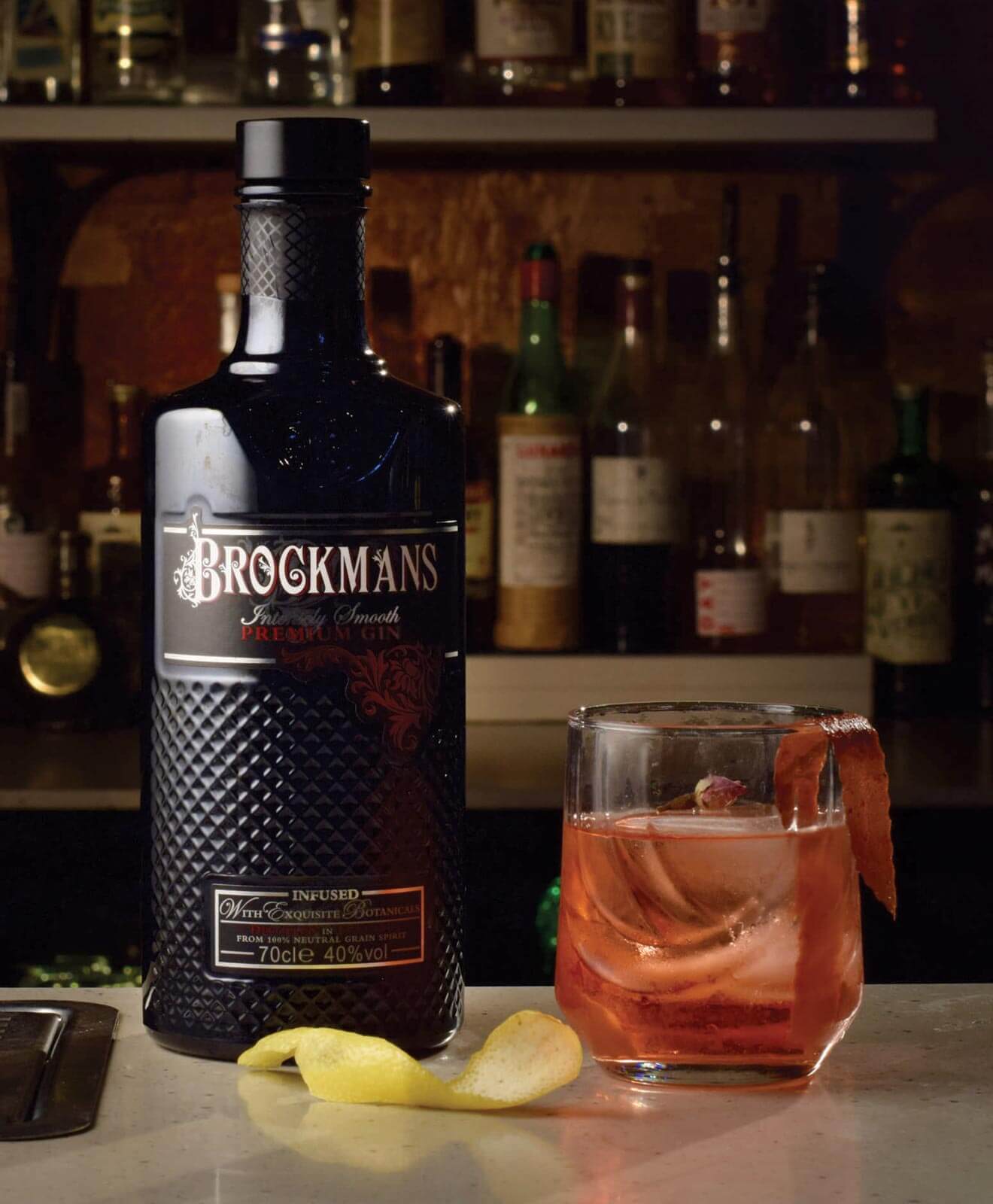 Brockmans 2018 Winner - Betty Brown, cocktail, bottle on table, dark background