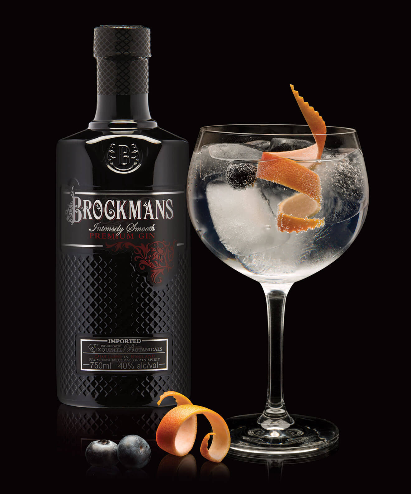 Brockmans Perfect Serve Gin & Tonic, bottle, cocktail with garnish, dark background