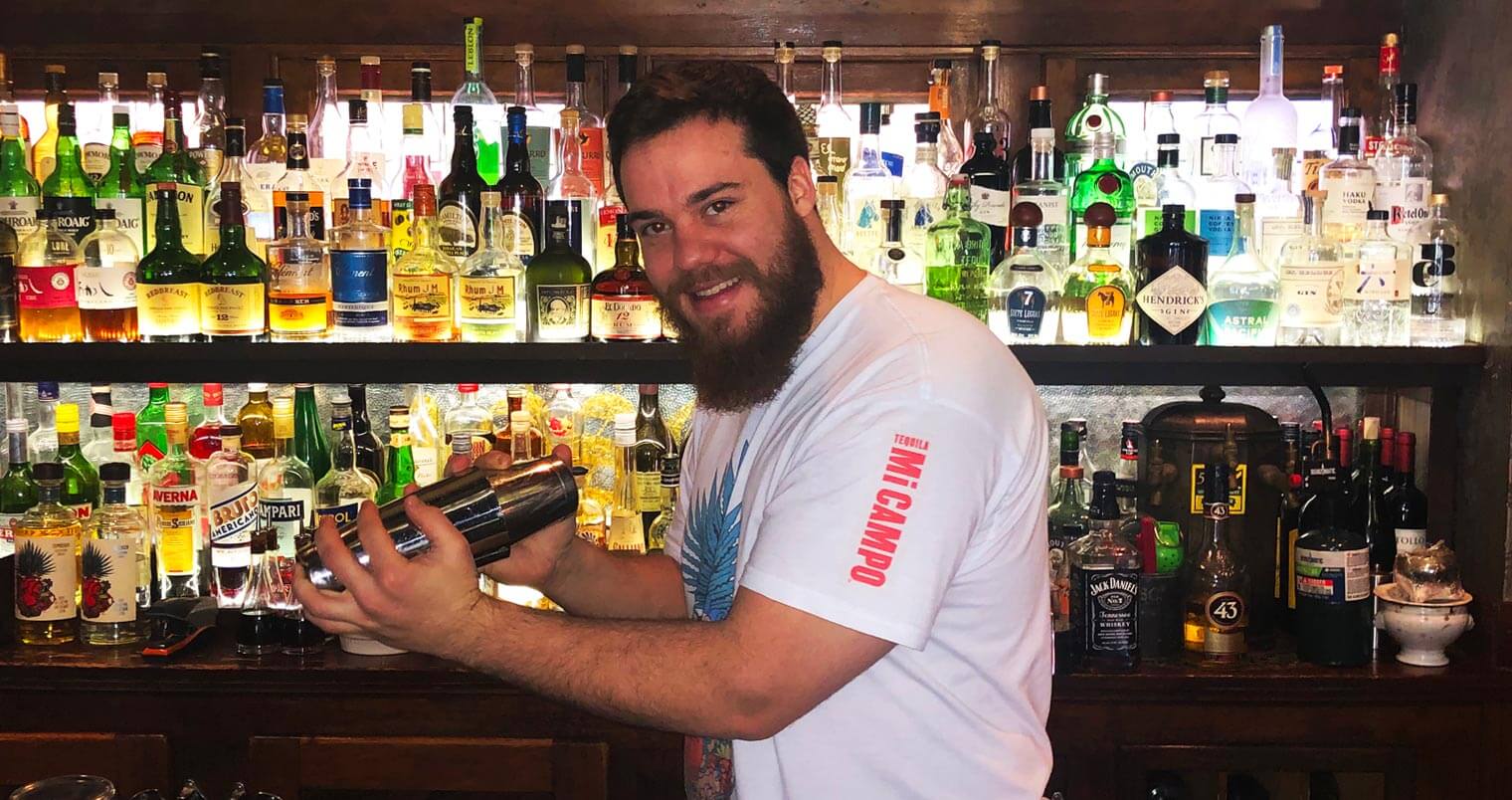 Cameron Masden behind the bar shaking, featured image