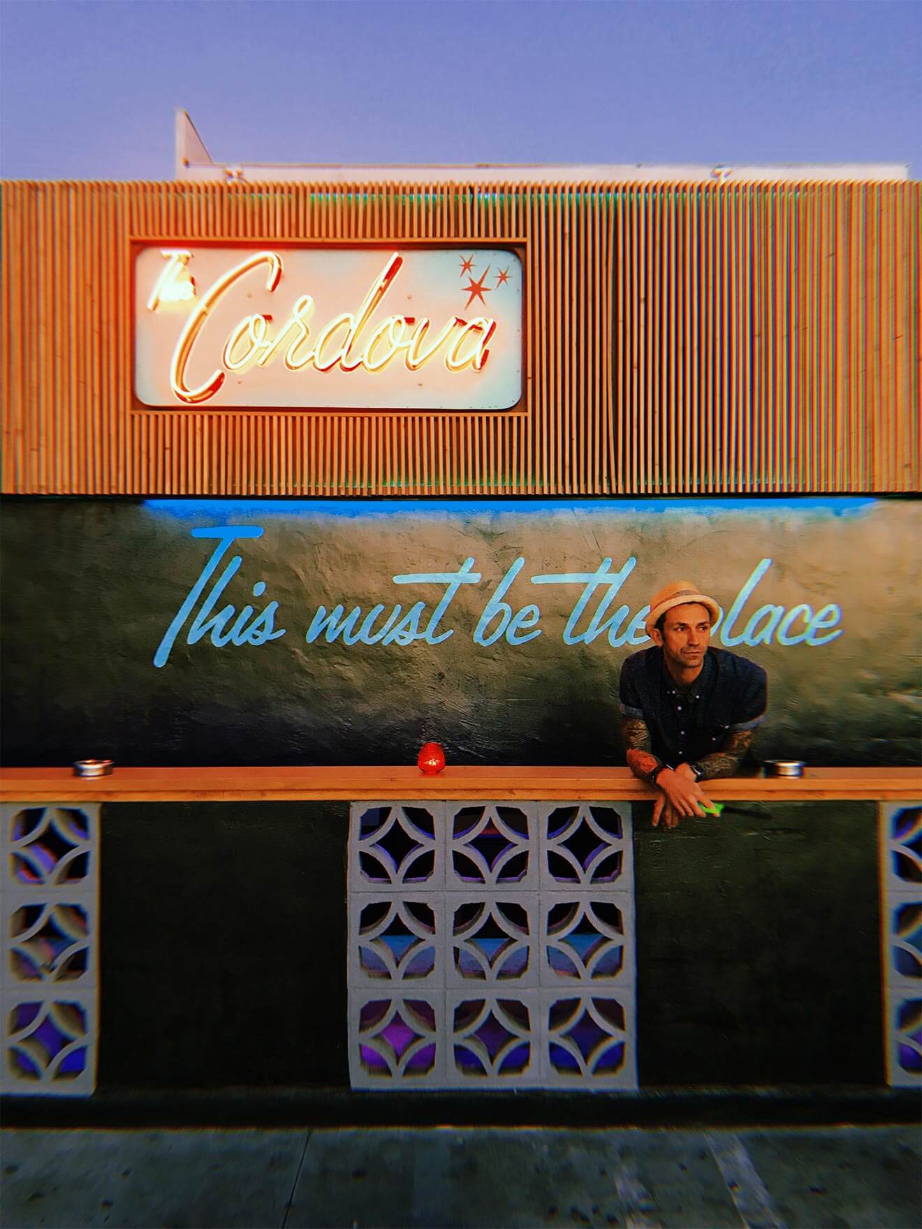 Chad Berkey - Chilled 100 Member, San Diego, standing on the balcony