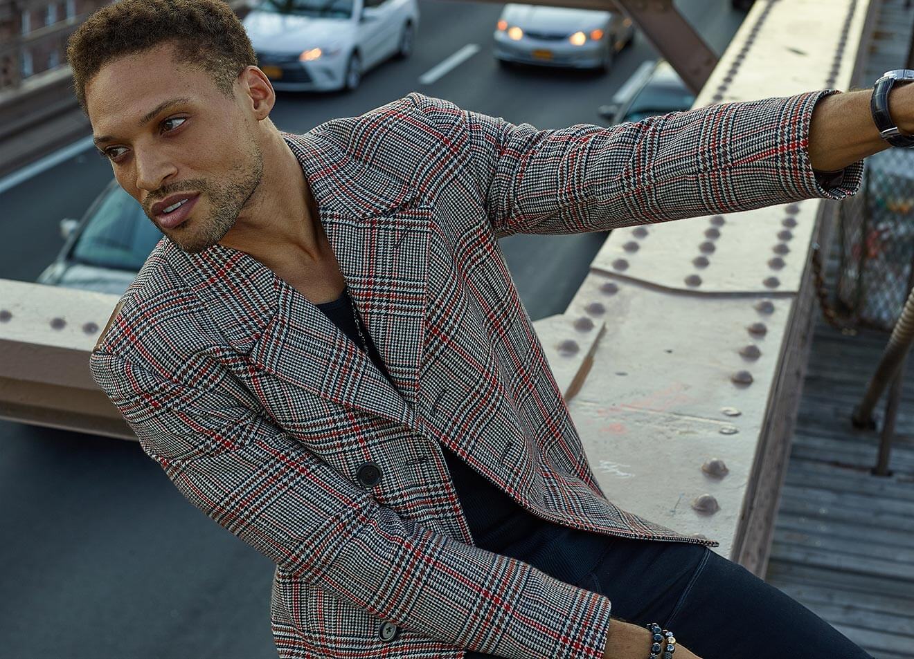 Chillin' with Cleo Anthony, side of a building hand, suit