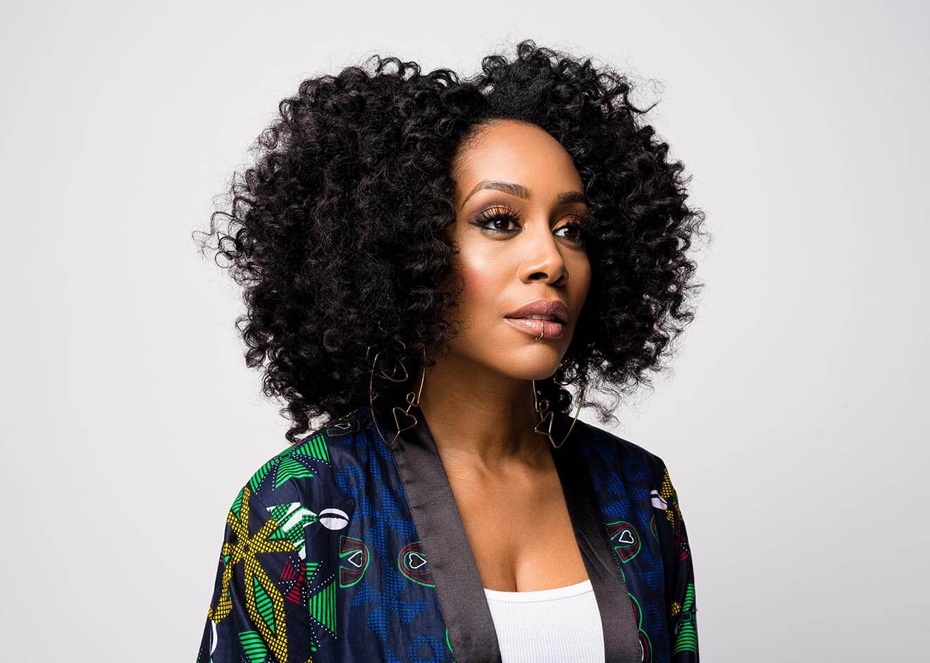 Chillin' with Simone Missick, side view serious