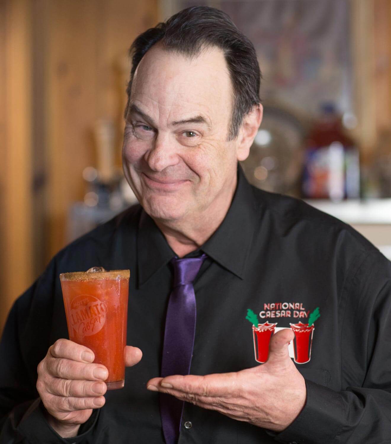 Dan Aykroyd’s Golden Caesar, presenting the cocktail with a smile