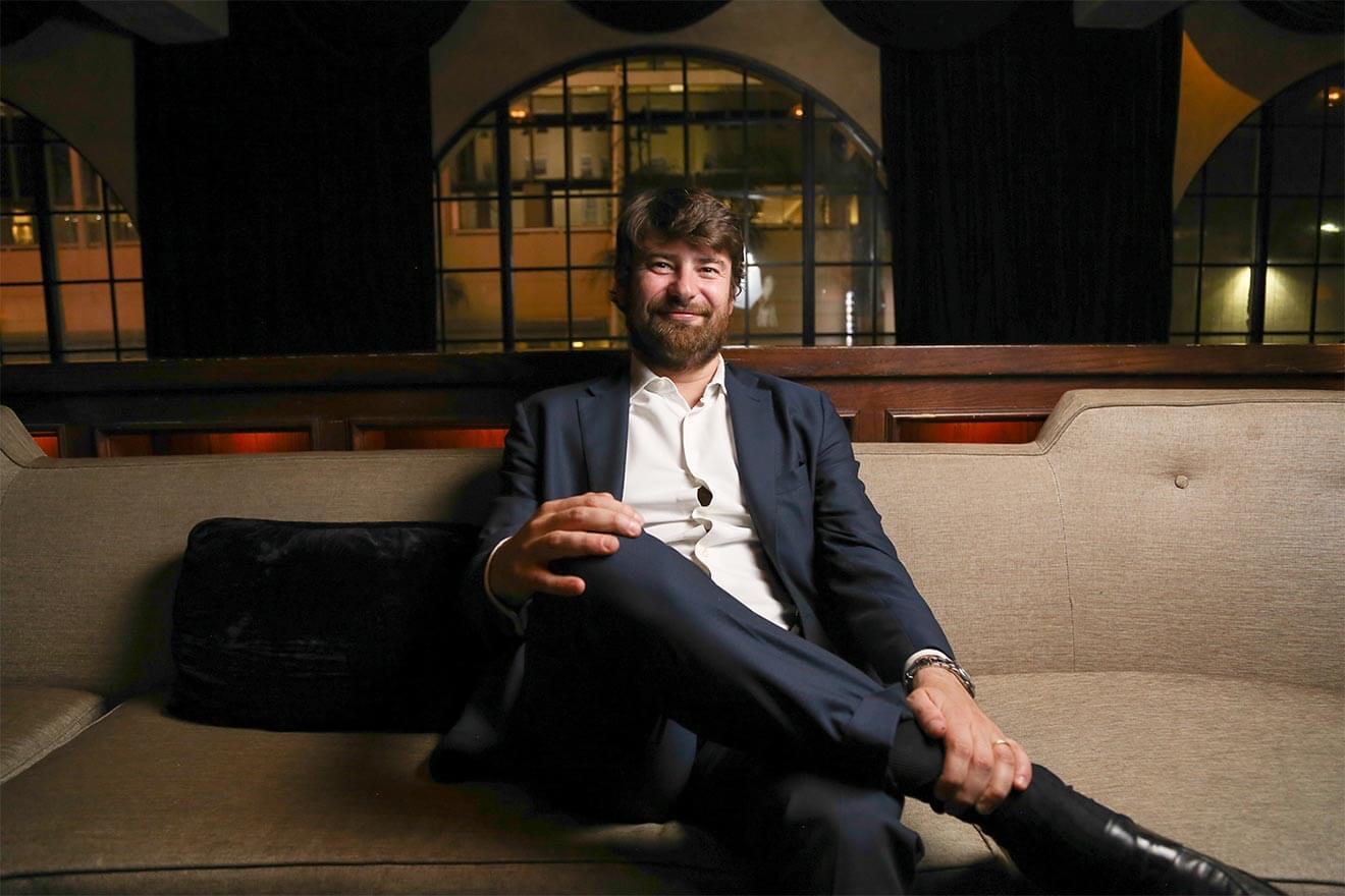 Edoardo Branca, sitting on couch
