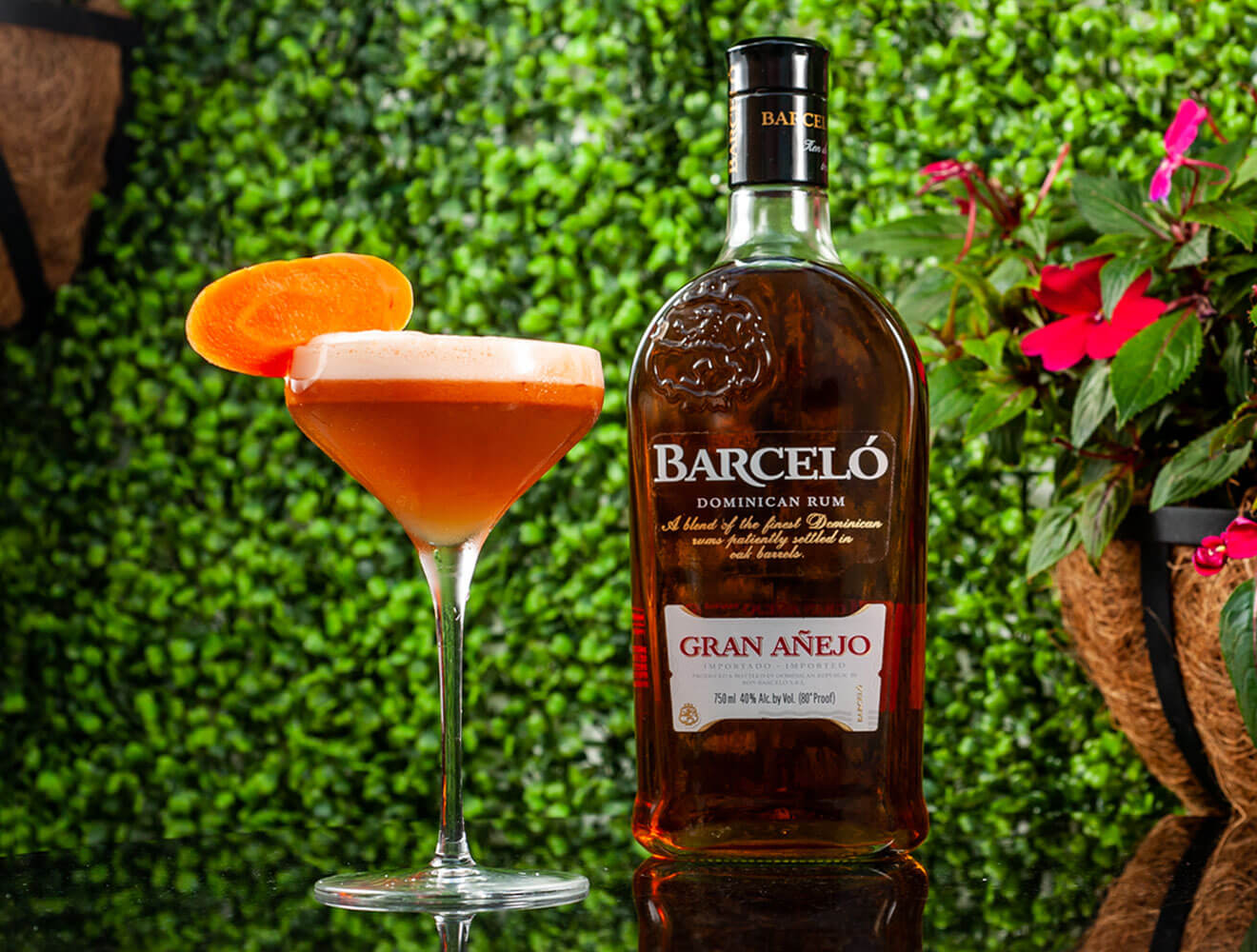 El Conejo Bueno, cocktail in garden with carrot garnish