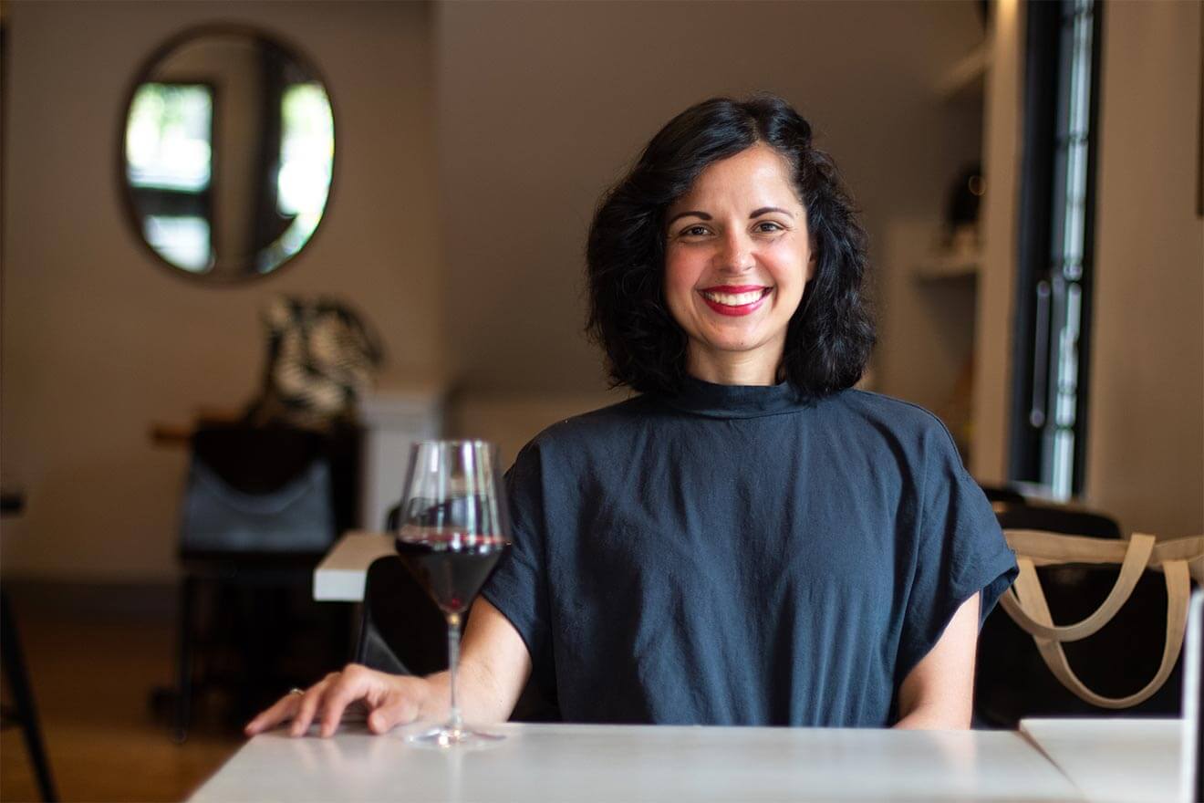 Gabriela Davogustto portrait at table