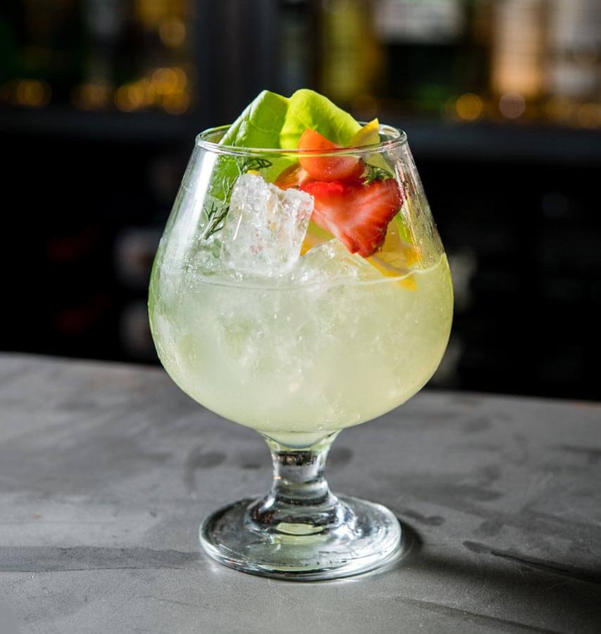 Garden Party, cocktail in bowl glass, with garnish