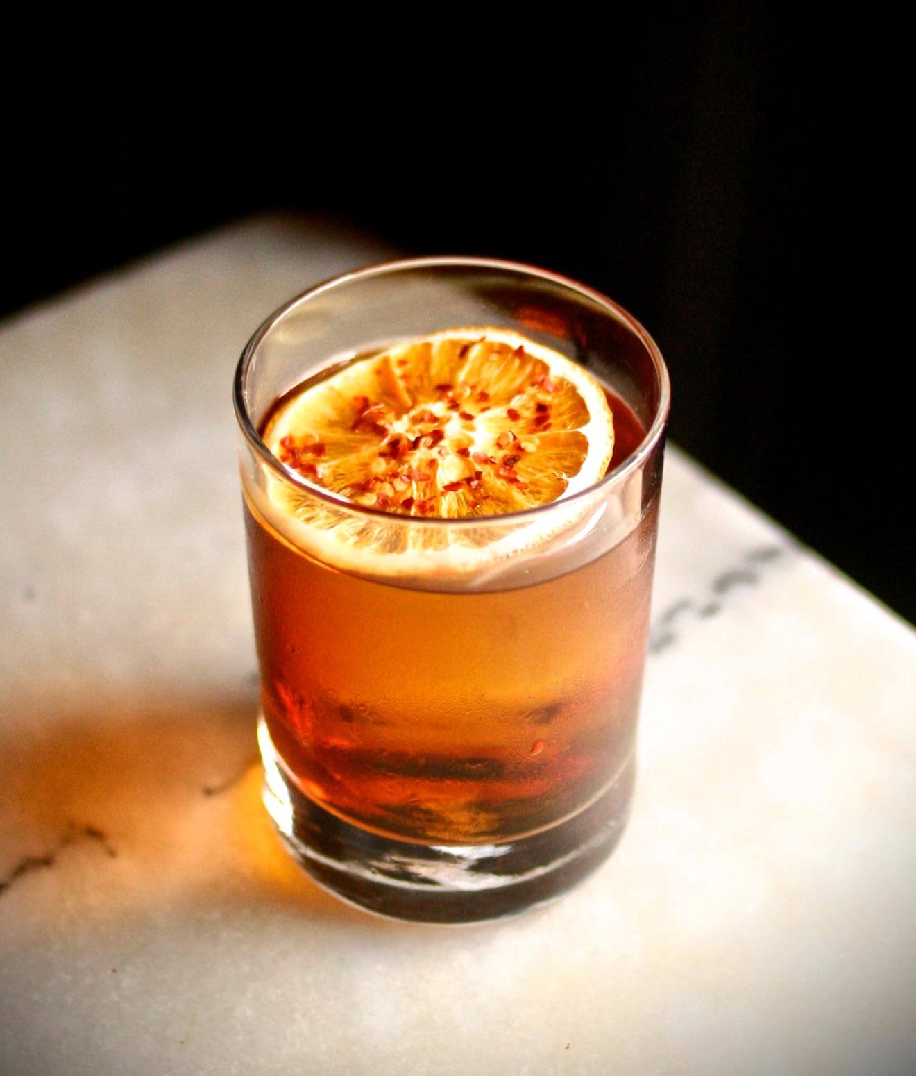 Gaucho With a Vengeance, cocktail with dried fruit garnish