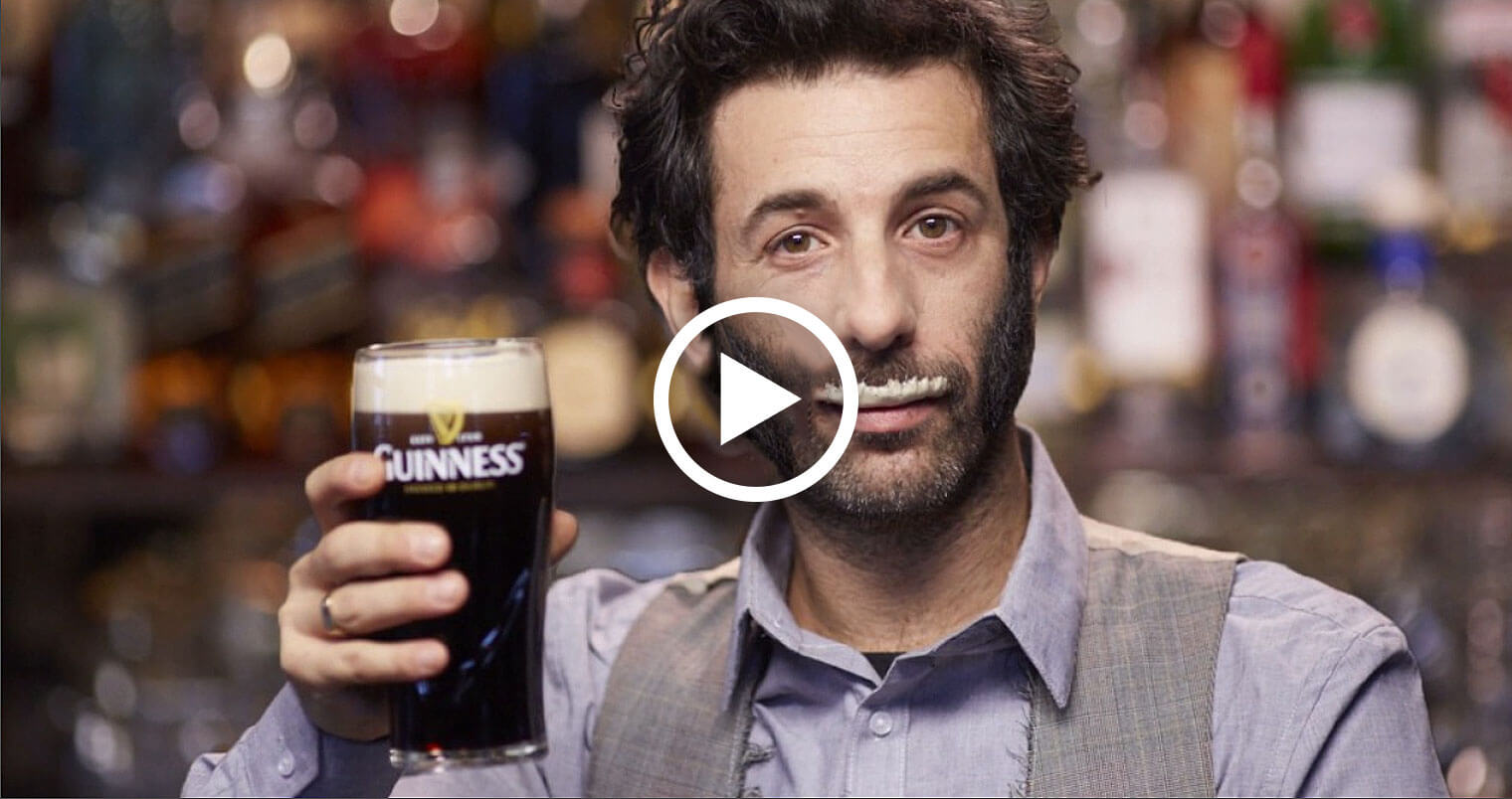 guiness give a stache