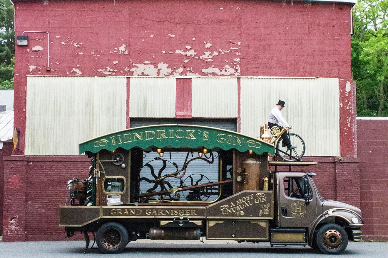 Hendrick's Gin Giant Cucumber Garnisher, truck against old building