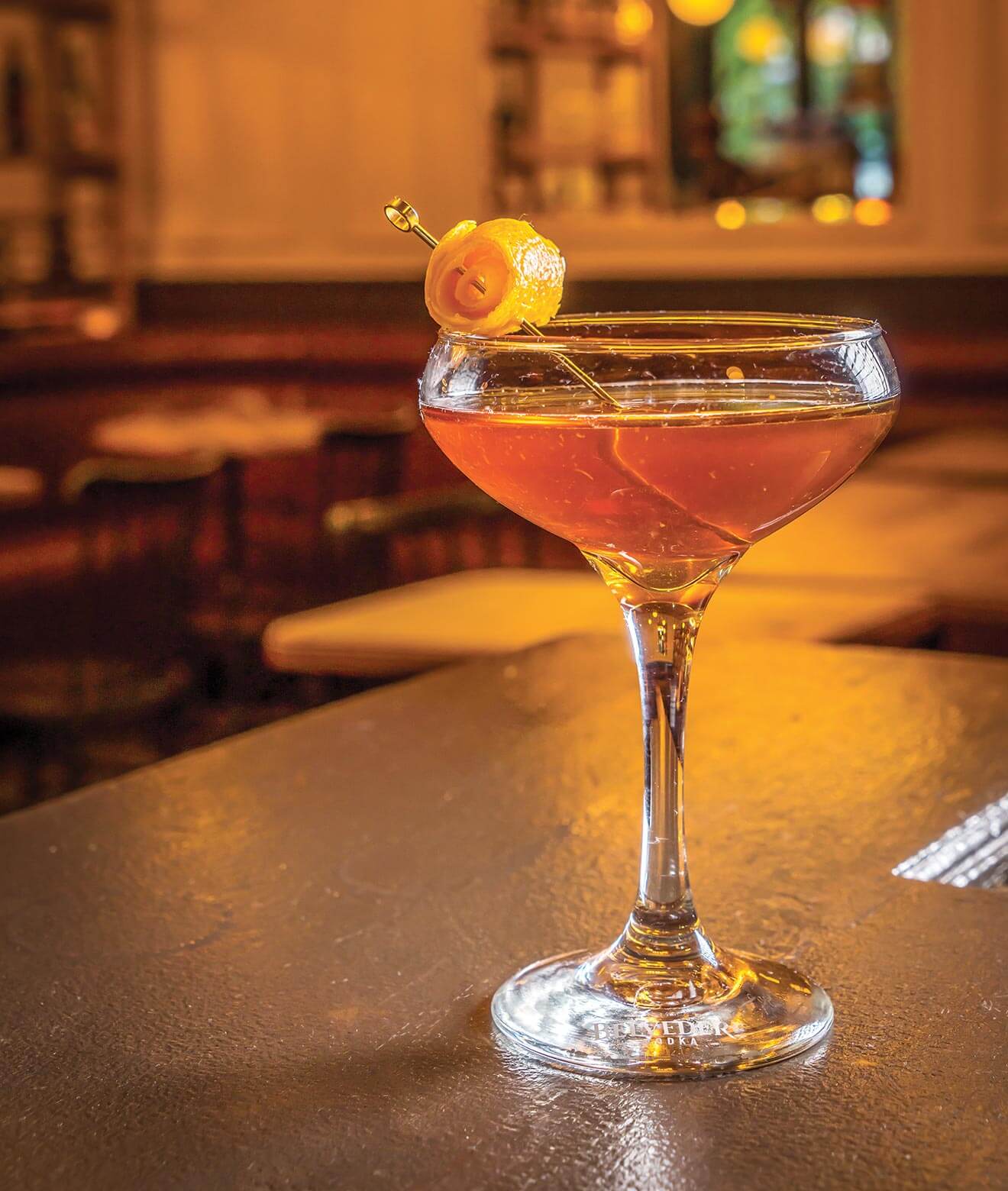 Holiday Sip cocktail with garnish on table