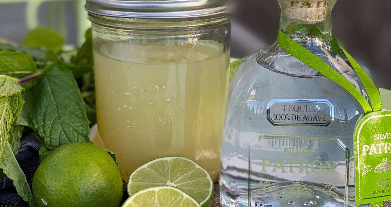 Honey Salt Cocktails on the Go, cocktail and patron bottle, limes, featured image
