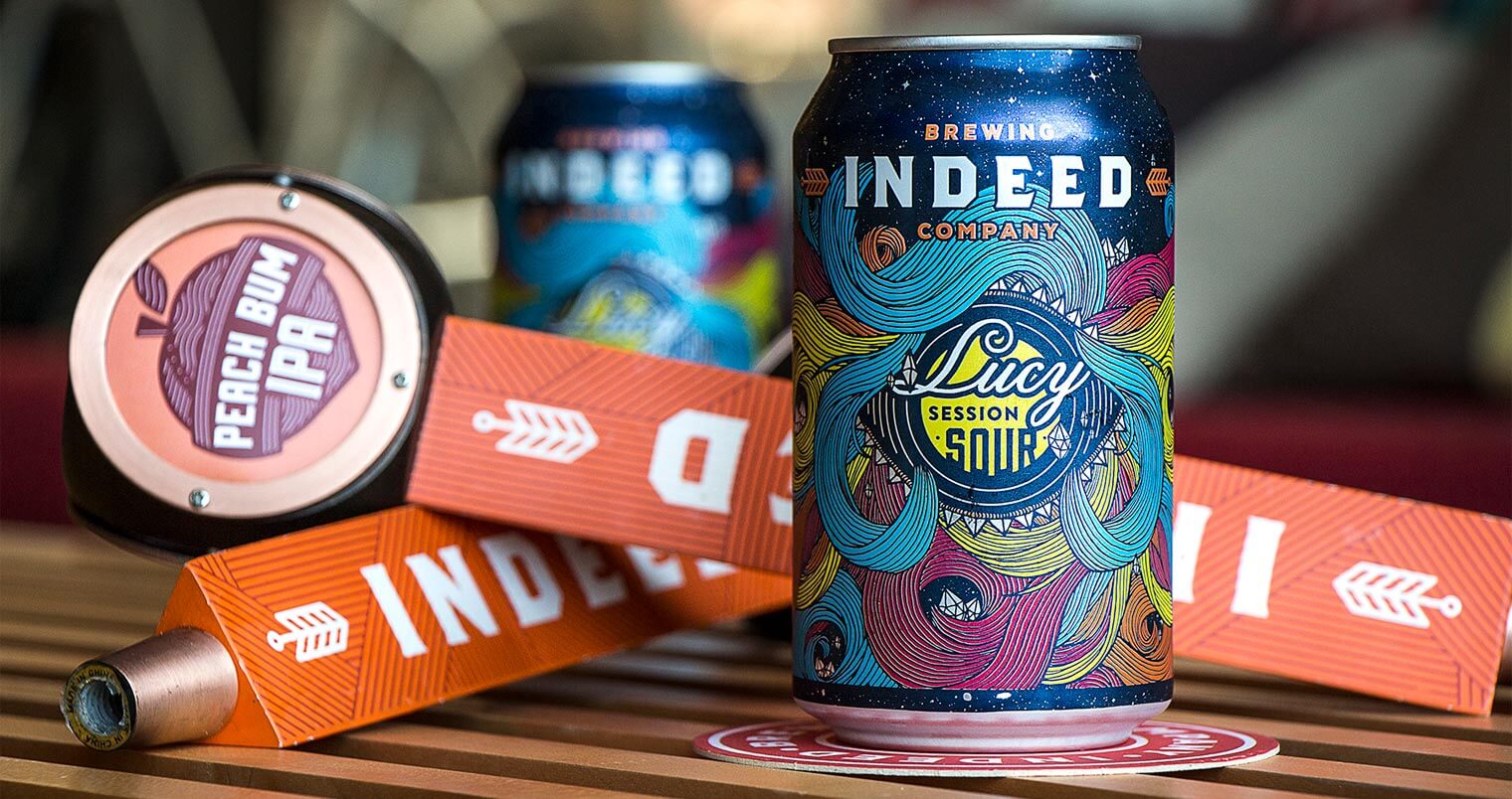 Indeed Brewing Co. Releases Lucy Session Sour Ale and Peach Bum IPA, featured image