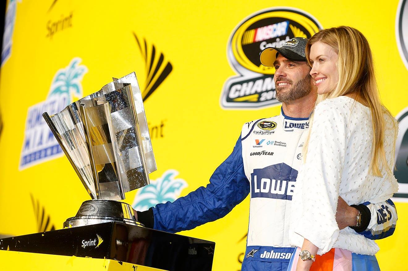 Jimmie-Johnson-accepting-award-with-wife