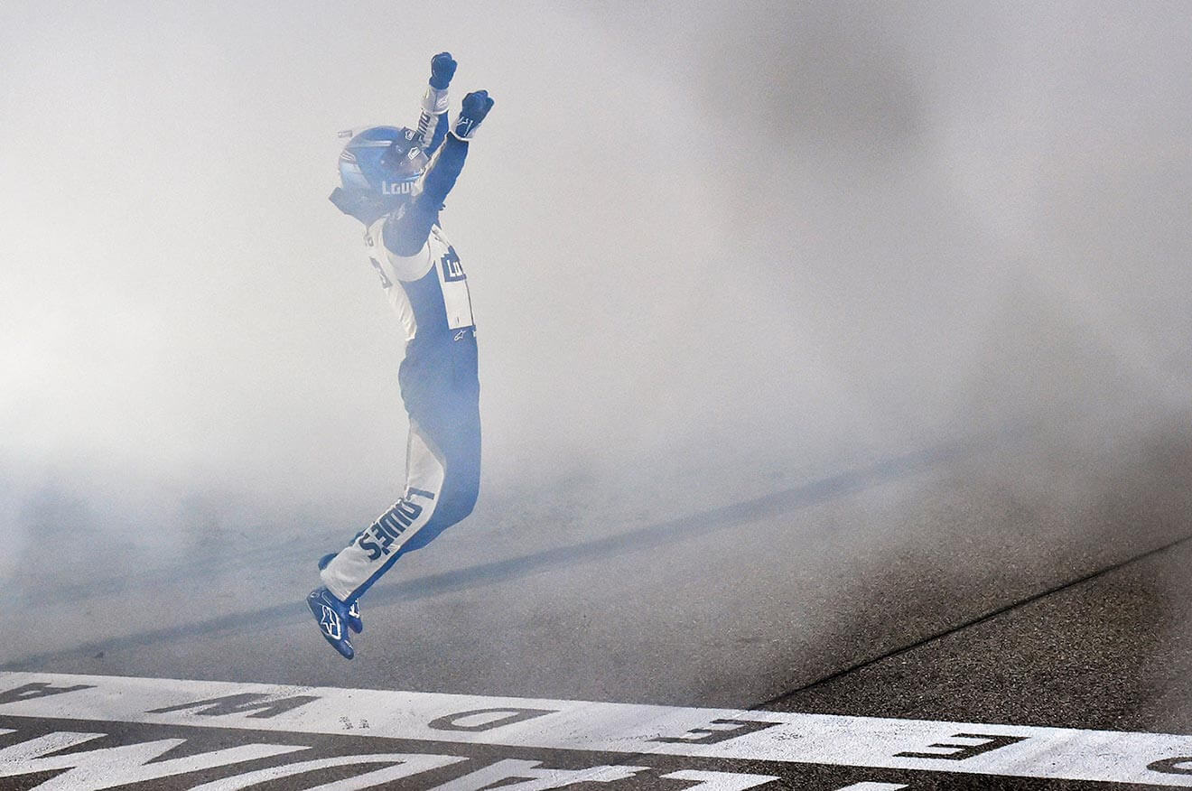 Jimmie-Johnson-victory-leap-at-finish-line