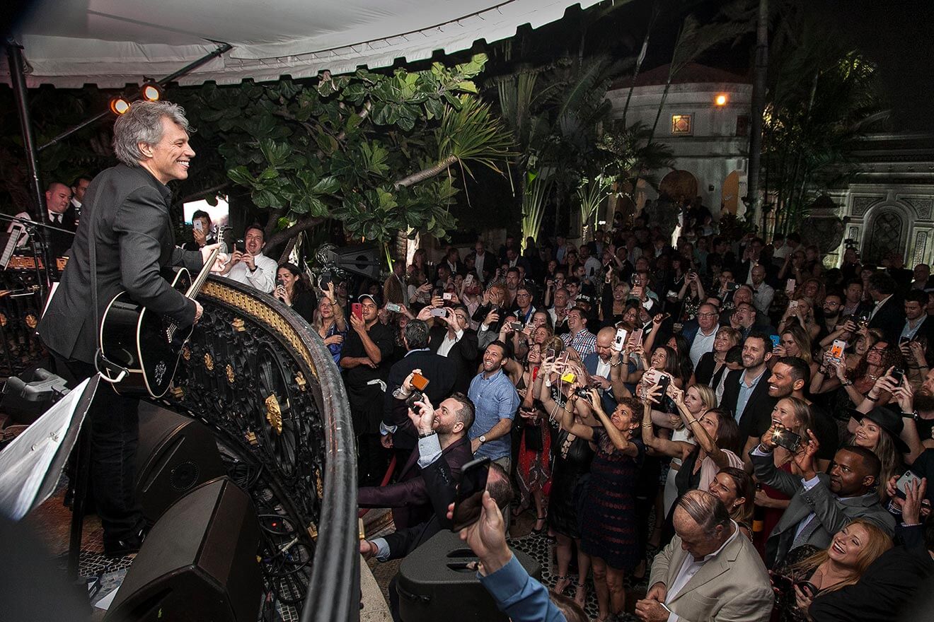 Jon Bon Jovi Performs above crowd