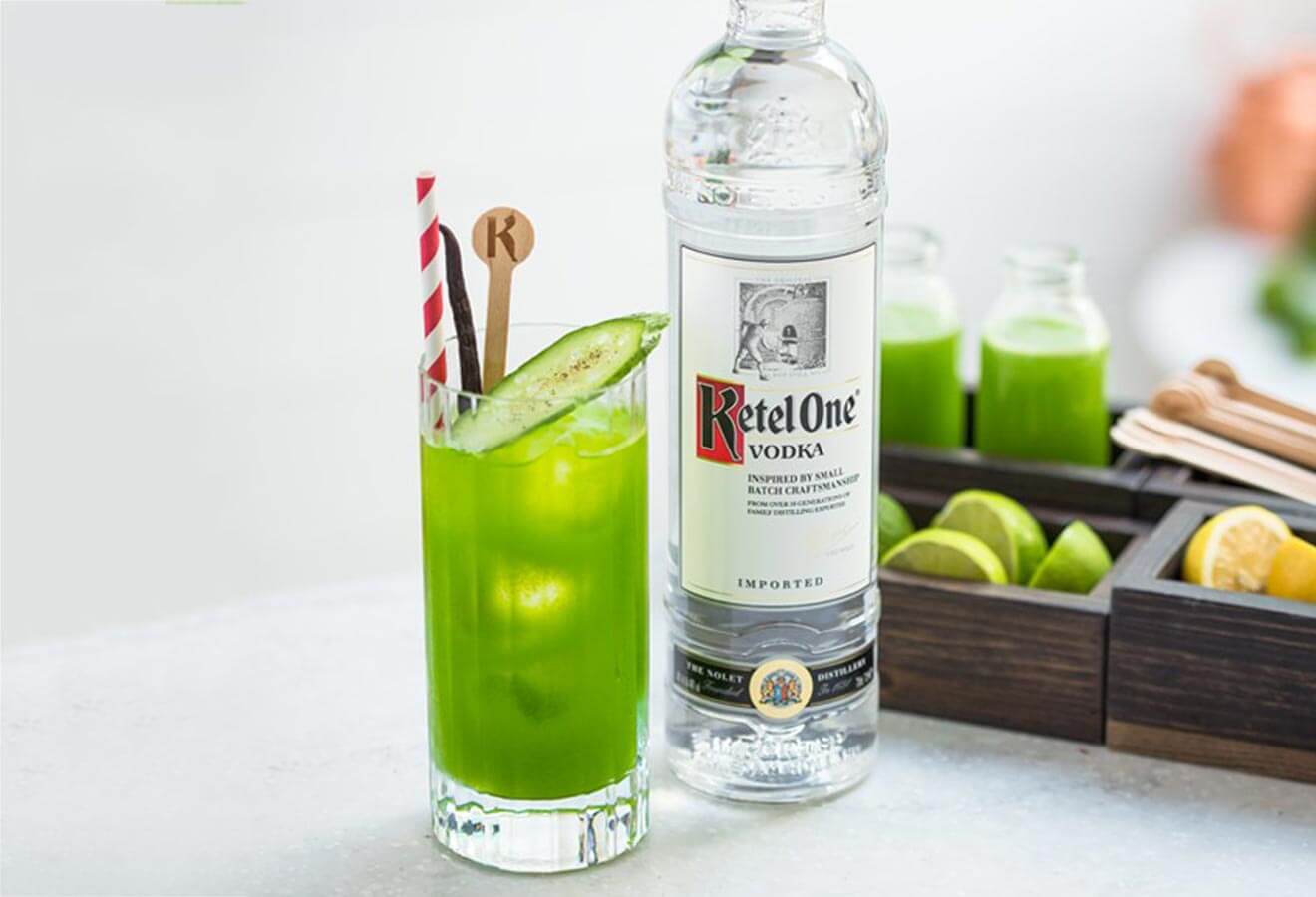 Ketel One Green Mary, cocktail with garnish, bottle, and fresh veg