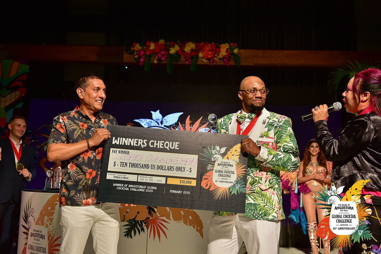 L-R Angostura Chairman, Terrence Bharath, Marv Cunningham, AGCC 2020 Champion, Franky Marshall AGCC MC