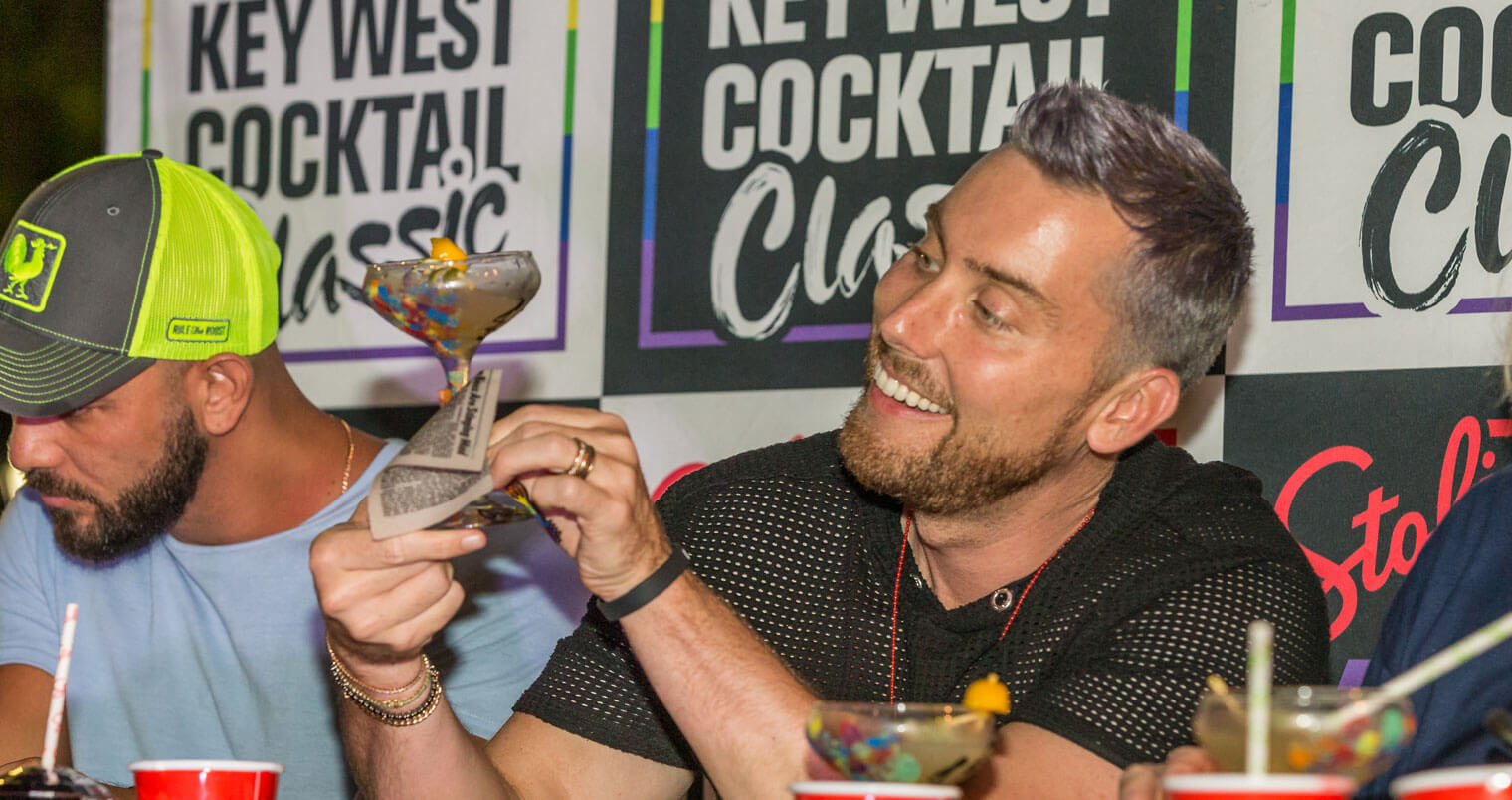 Lance Bass Judging, holding cocktail entry, featured image