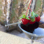 Lightsaber cocktail with Anchors garnish