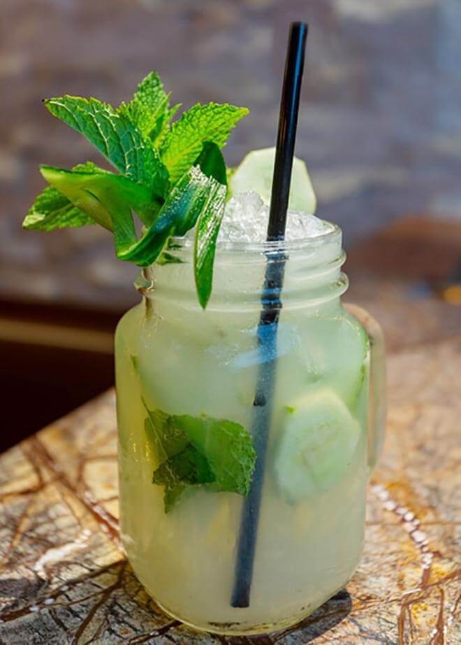 Logos cocktail in mason jar, garnish and straw