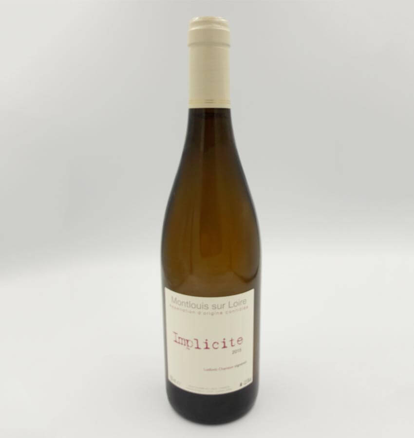 Ludovic Chanson Implicite 2015, bottle on table, light background