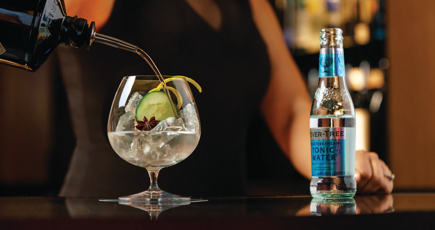 Signature Gin & Tonic Served at Castell Rooftop Lounge, featured image