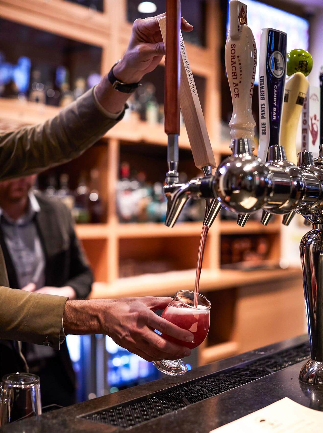 Makeready Libations & Liberation, barteneder pouring tap