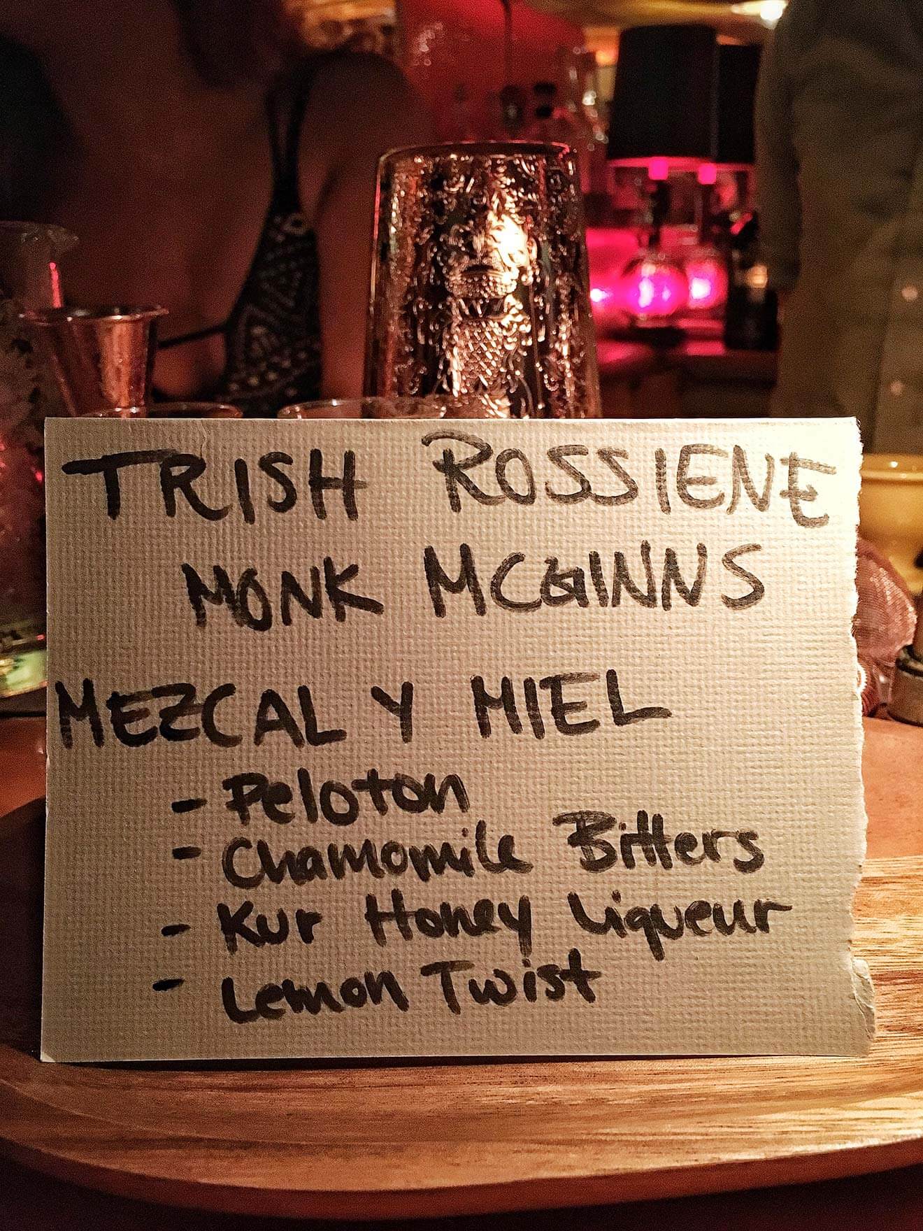 Mezcal y Miel, hand written message on bartop