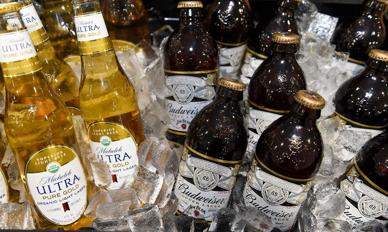 Michelob Ultra Pure Gold and Budweiser Copper Lager, bottles on ice