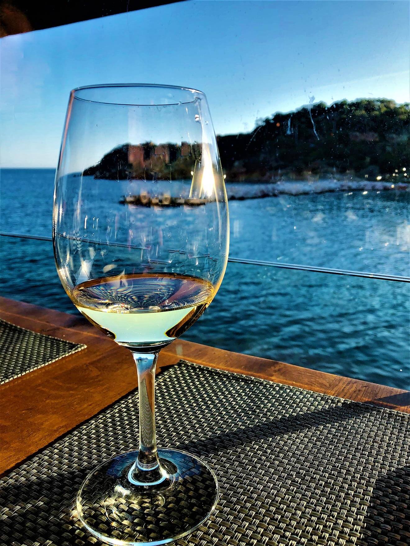Moorings Restaurant, wine glass, view of the harbor