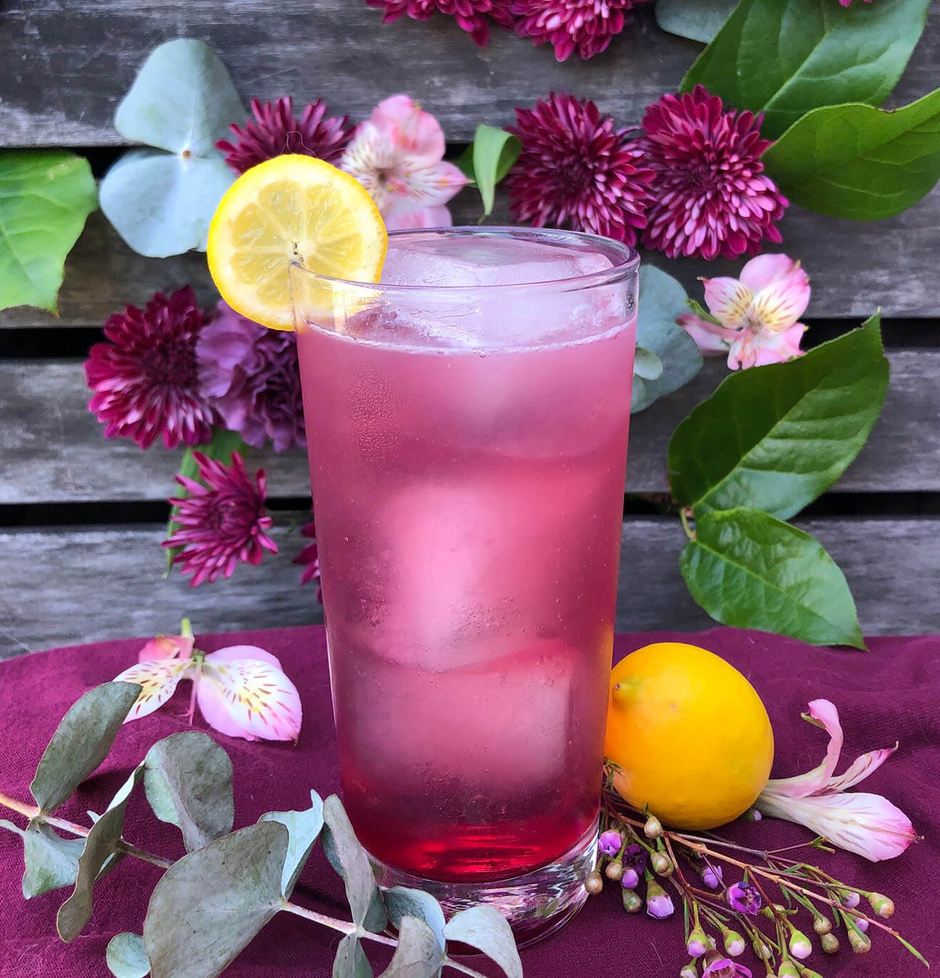 Honey Bear cocktail with flower garnishes