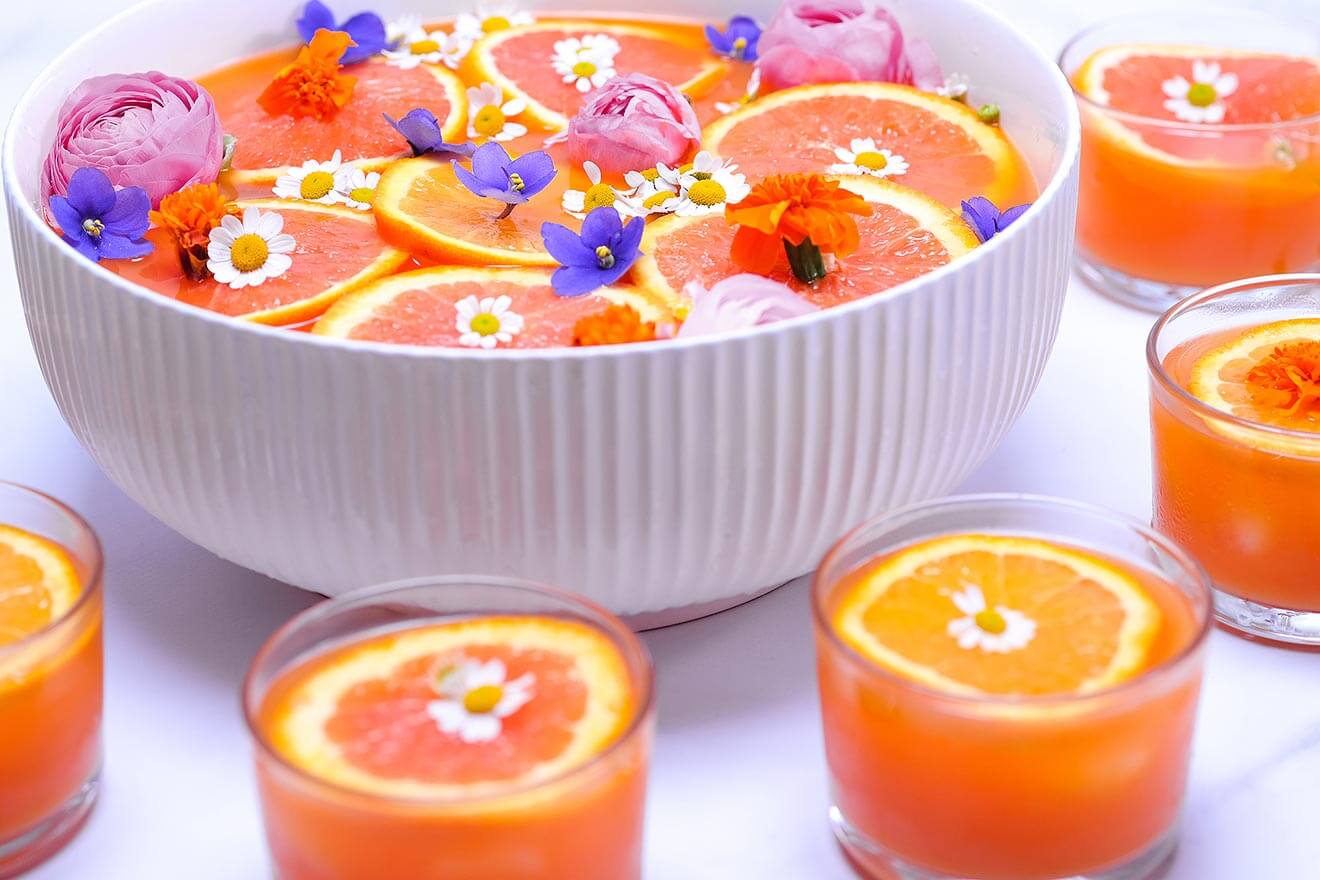 NOLET’S Silver Carrot & Pineapple Punch, bowl of punch with cocktails