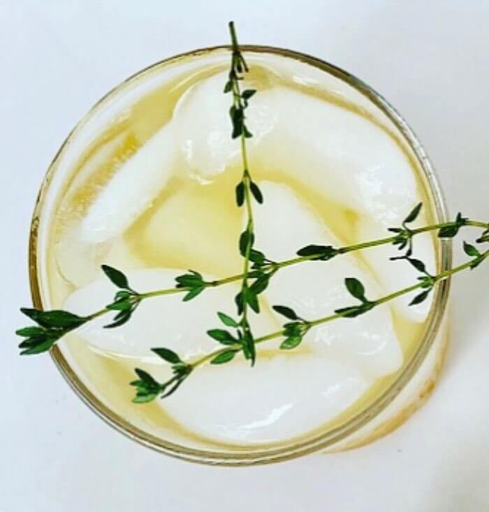 NUE Cider Thyme Tonic, cocktail, above shot, thyme garnish