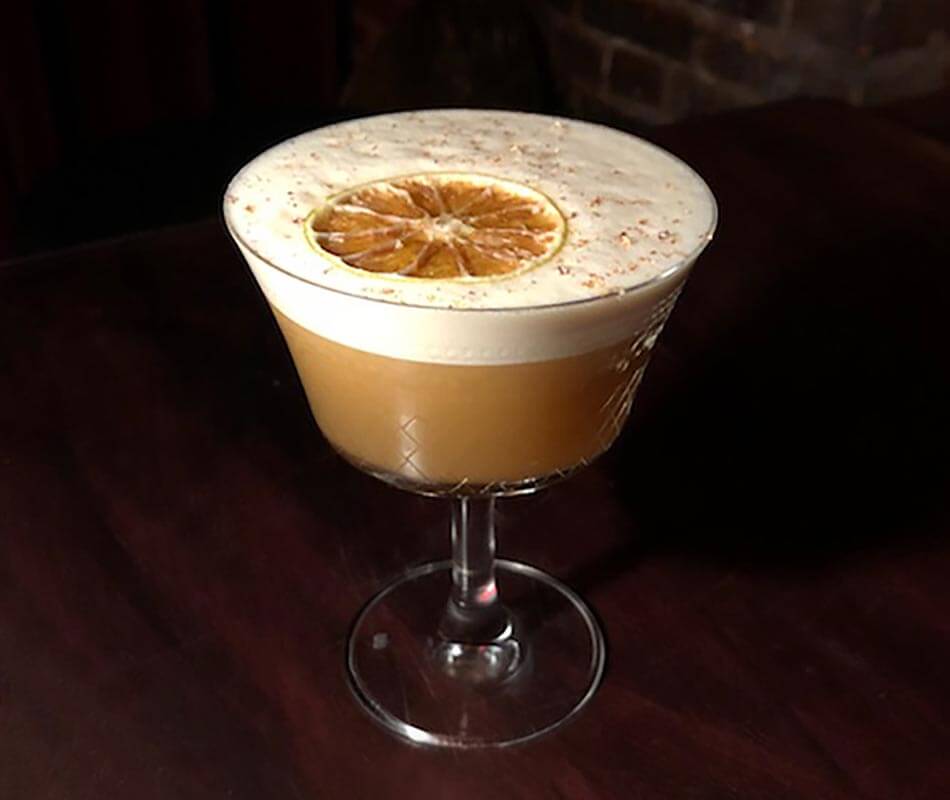 Papas Bitter Truth, cocktail on dark background