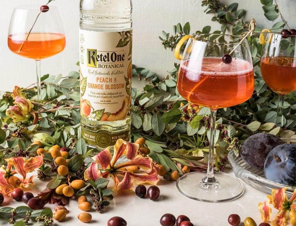 Peaches & Cranberry Spritz, cocktails and ketel one bottle, decorations